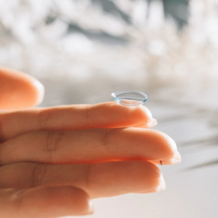 contact lens on a finger tip
