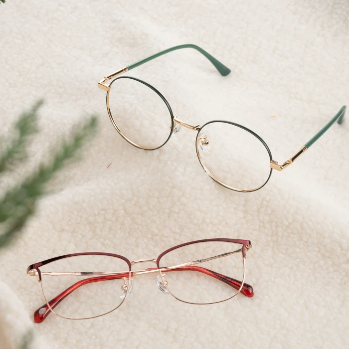 Two spectacles on a carpet background